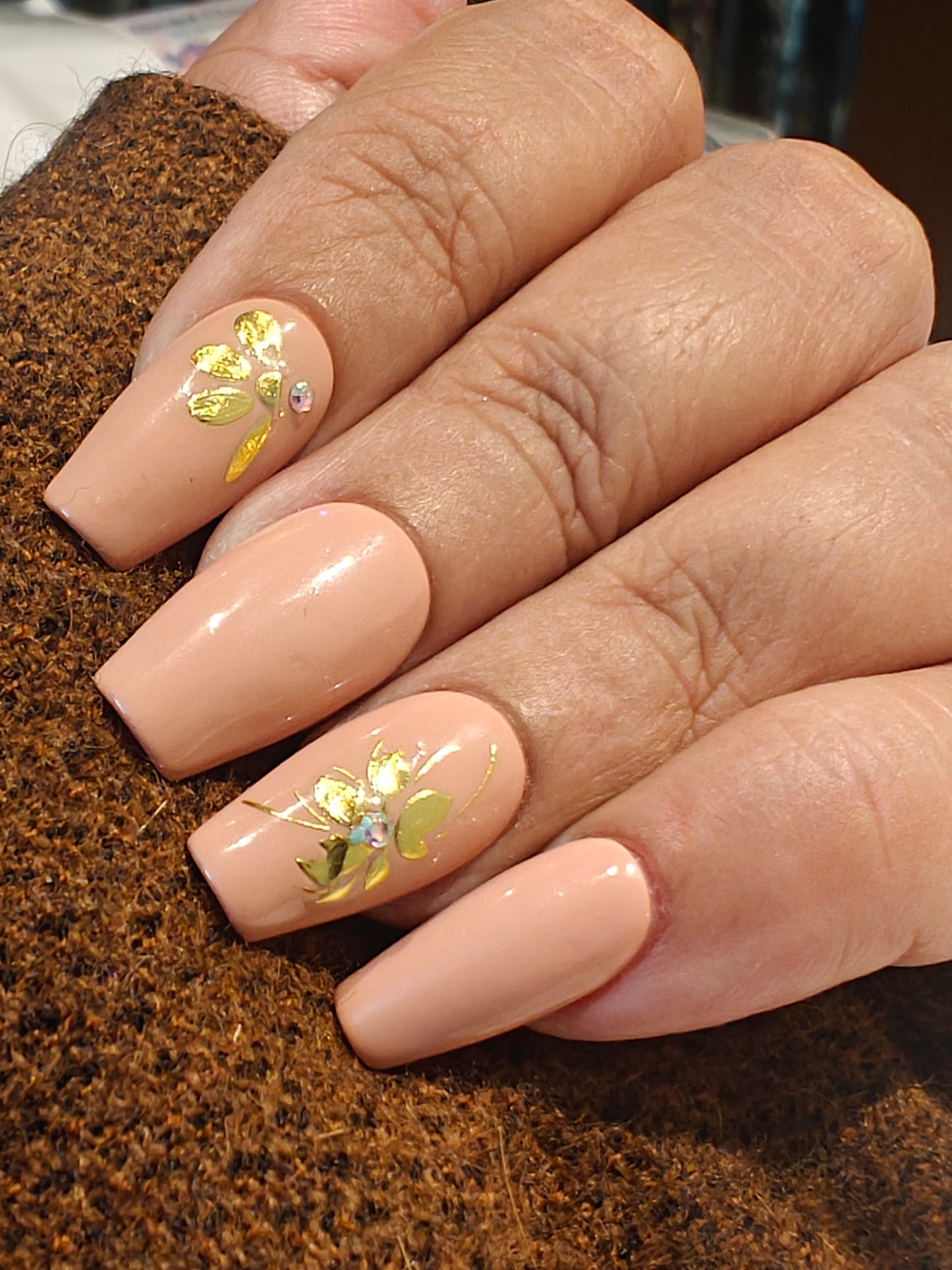Coffin shape Nude nails with golden flowers
