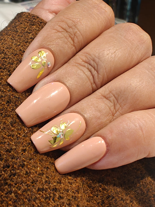 Coffin shape Nude nails with golden flowers
