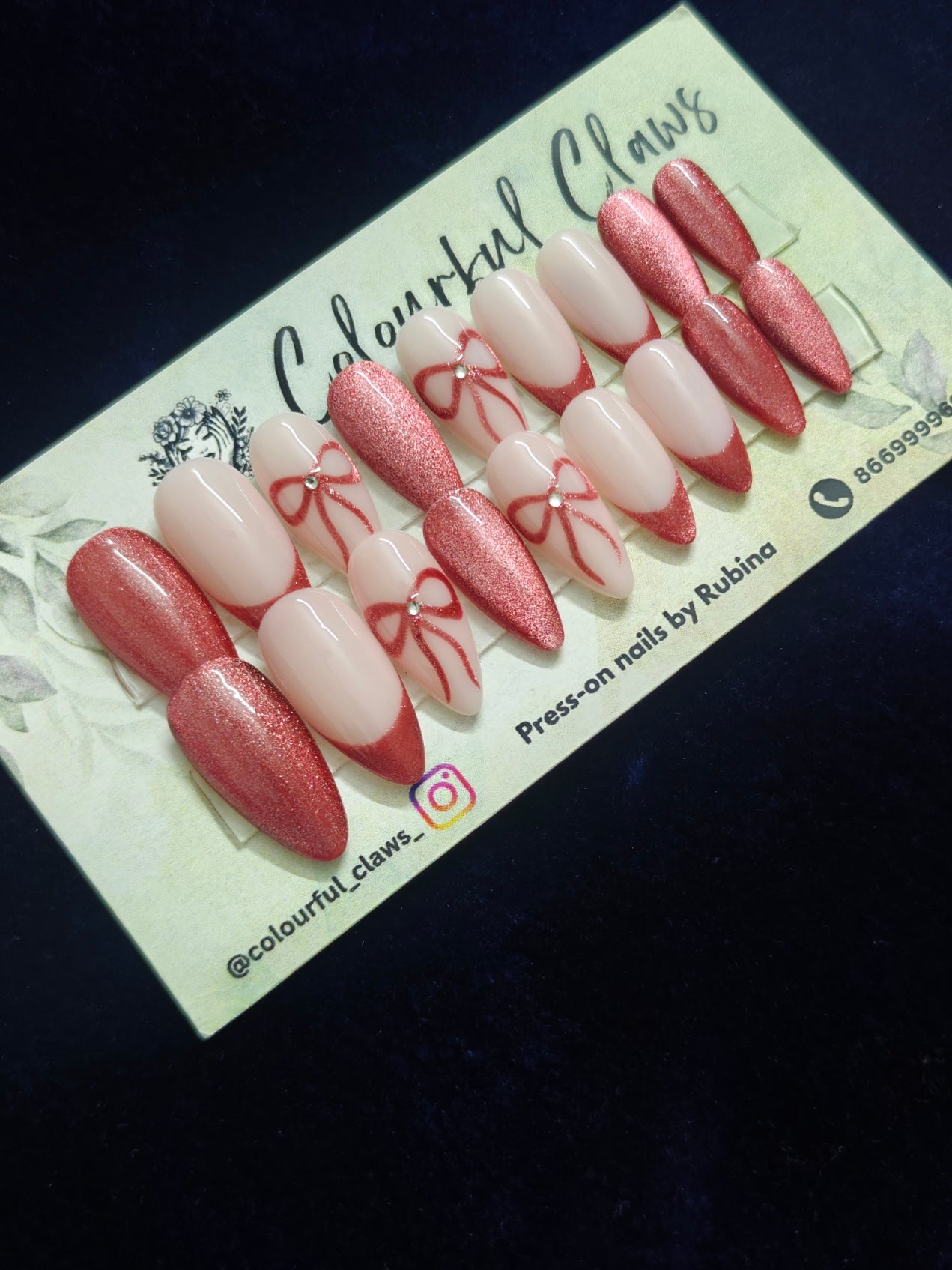 Red Almond Christmas Nails With Bow